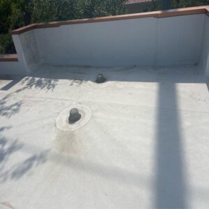 roof cleaning service with drainage vents and smooth concrete surface showing signs of wear and sunlight shadows